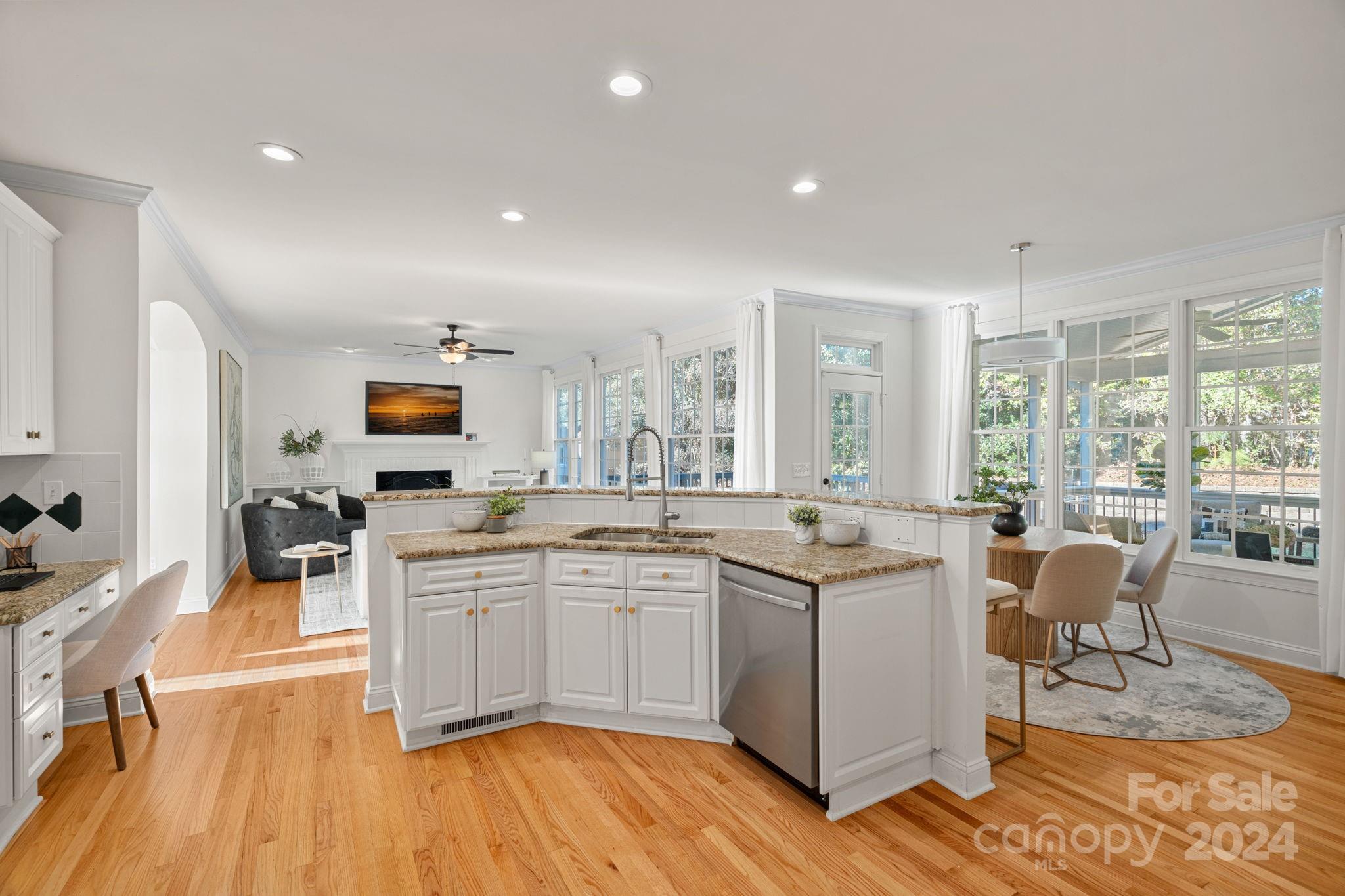 3425 Rhett Butler Place Charlotte, NC 28270 - Photo 14 of 48 a kitchen with lots of counter top space and dining table