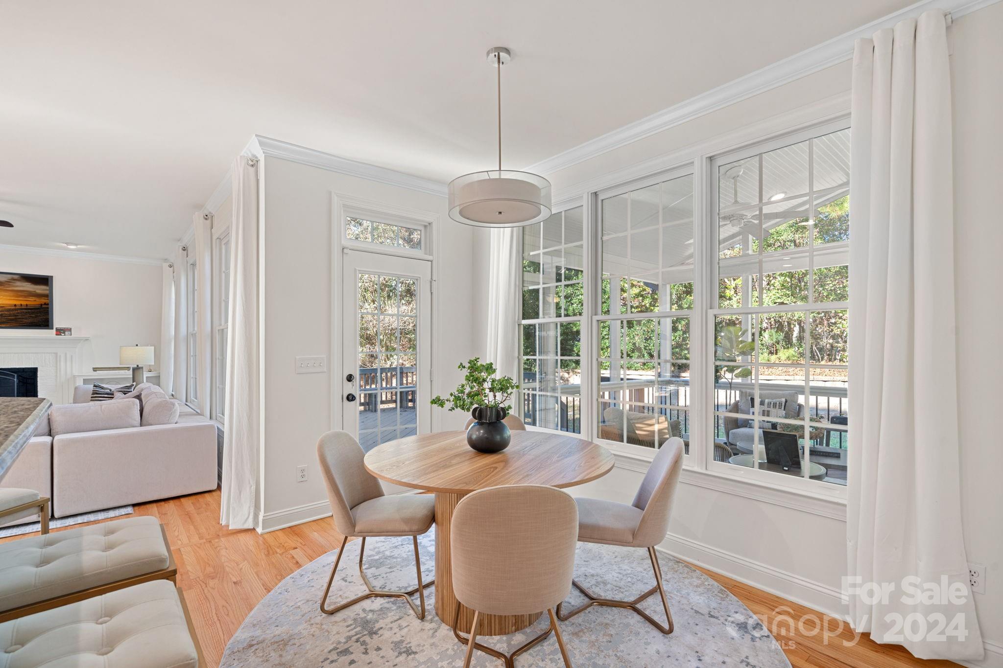 3425 Rhett Butler Place Charlotte, NC 28270 - Photo 15 of 48 a dining room with furniture window wooden floor