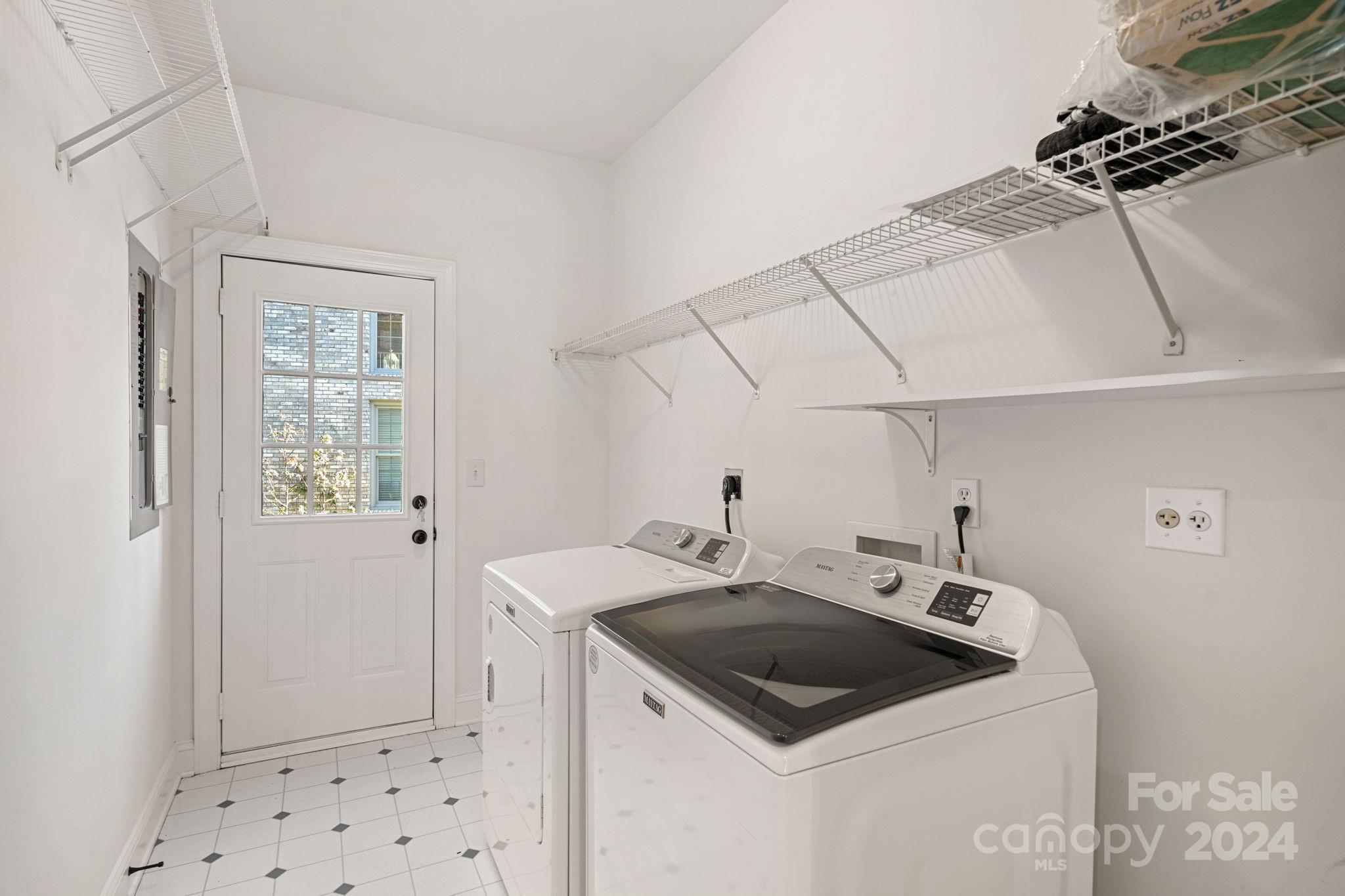3425 Rhett Butler Place Charlotte, NC 28270 - Photo 17 of 48 a utility room with sink dryer and washer