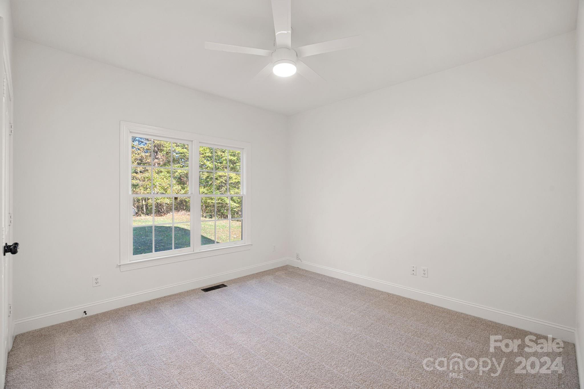3425 Rhett Butler Place Charlotte, NC 28270 - Photo 18 of 48 an empty room with a window