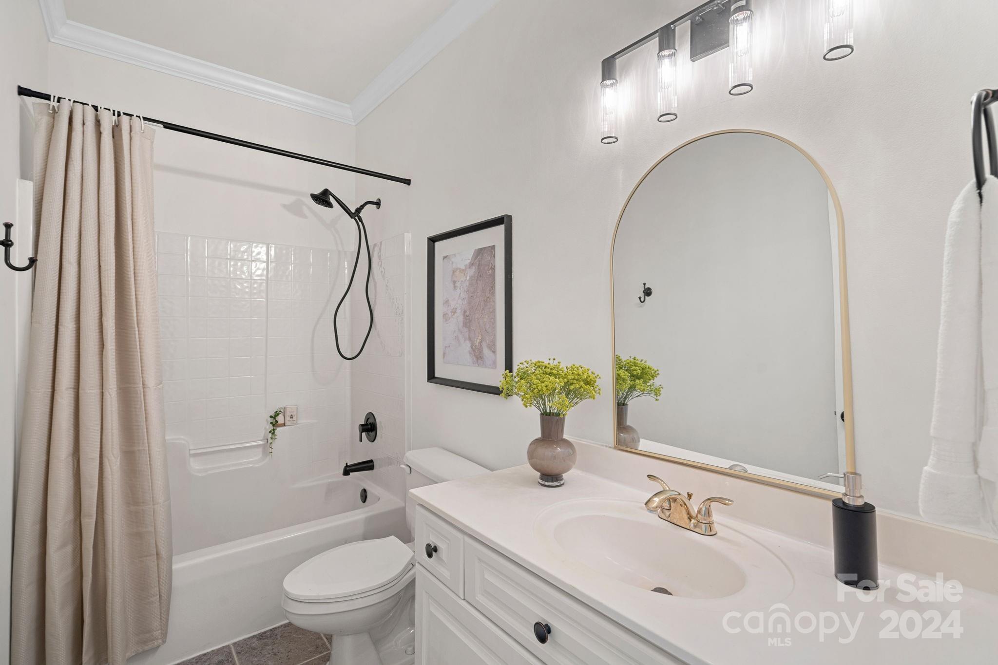 3425 Rhett Butler Place Charlotte, NC 28270 - Photo 19 of 48 a bathroom with a granite countertop sink a toilet and shower