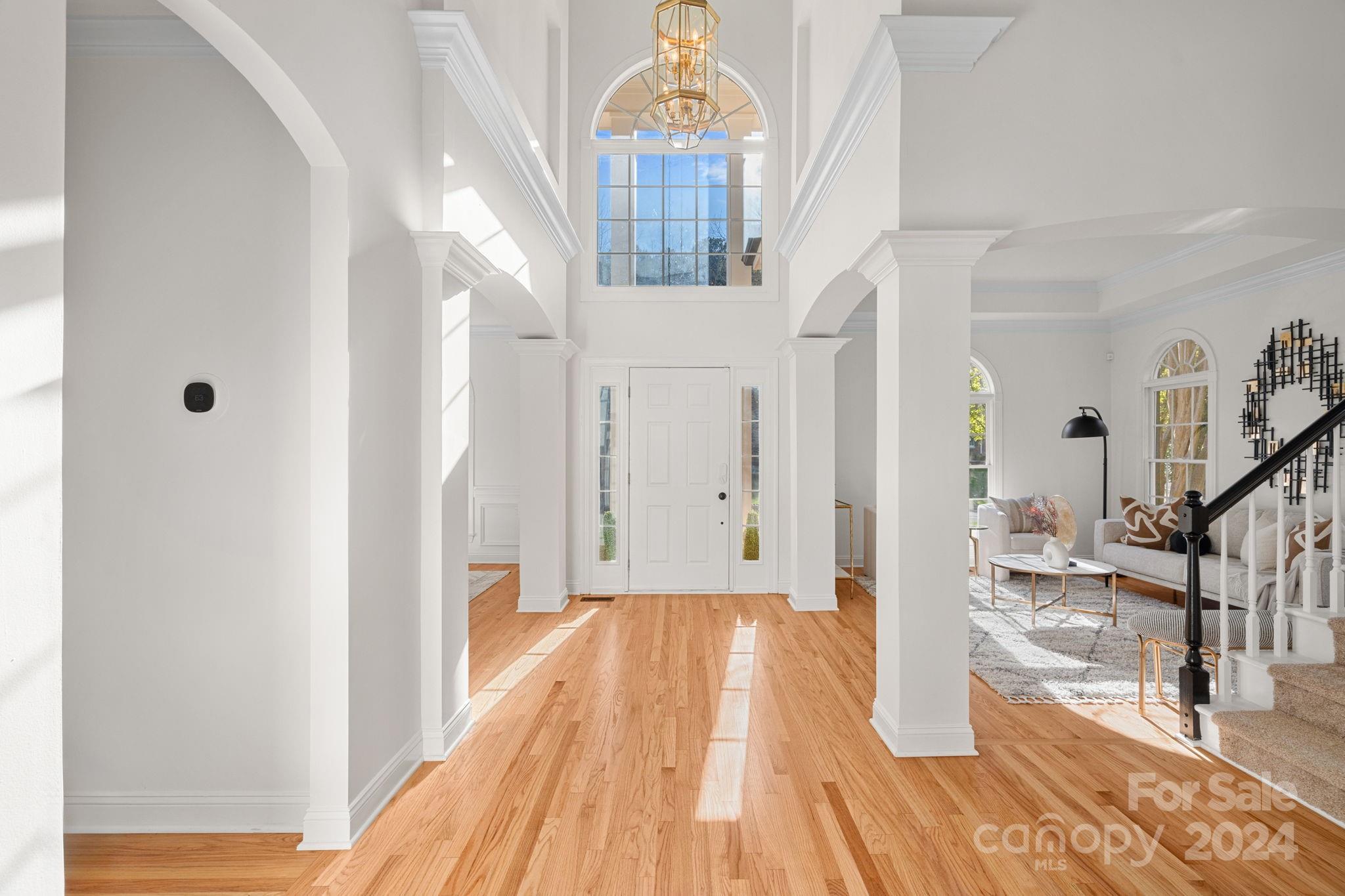 3425 Rhett Butler Place Charlotte, NC 28270 - Photo 2 of 48 a view of gallery with wooden floor
