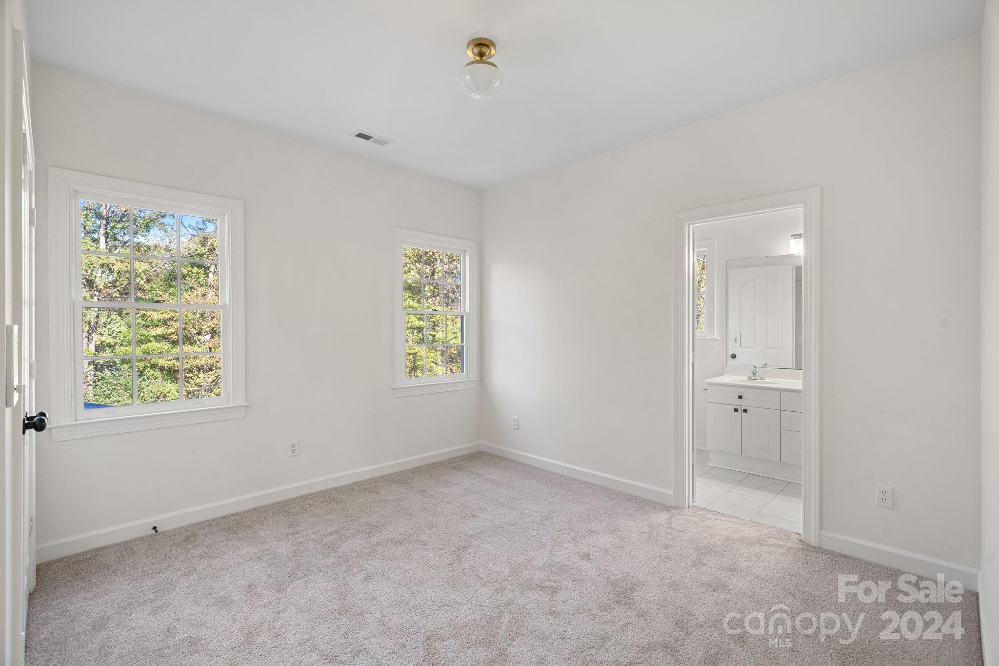 3425 Rhett Butler Place Charlotte, NC 28270 - Photo 26 of 48 a view of an empty room with a window