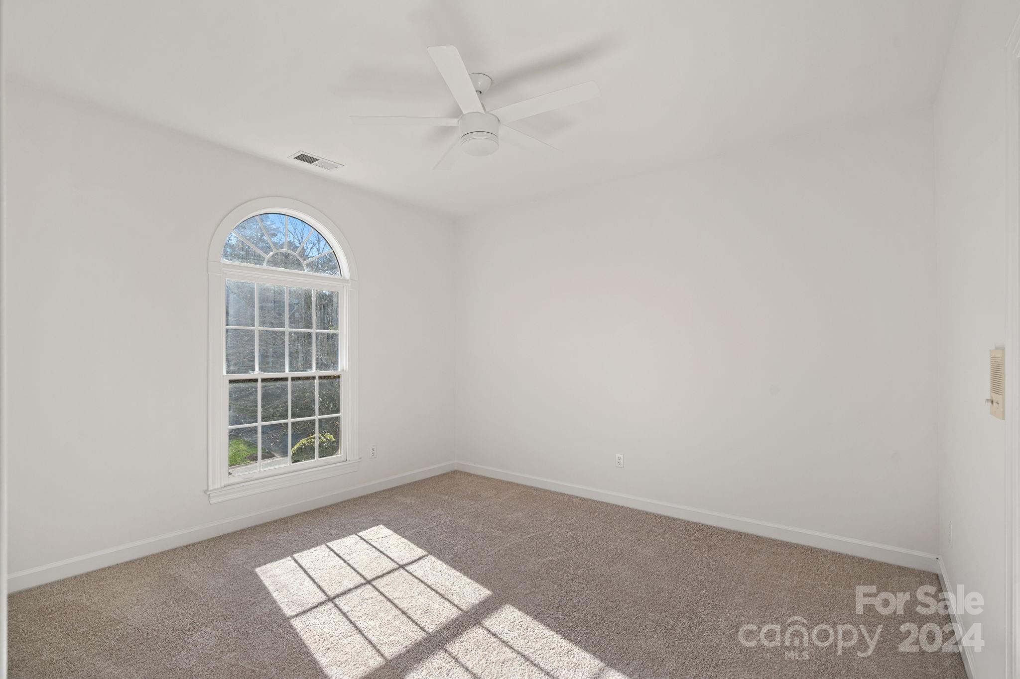 3425 Rhett Butler Place Charlotte, NC 28270 - Photo 29 of 48 an empty room with windows