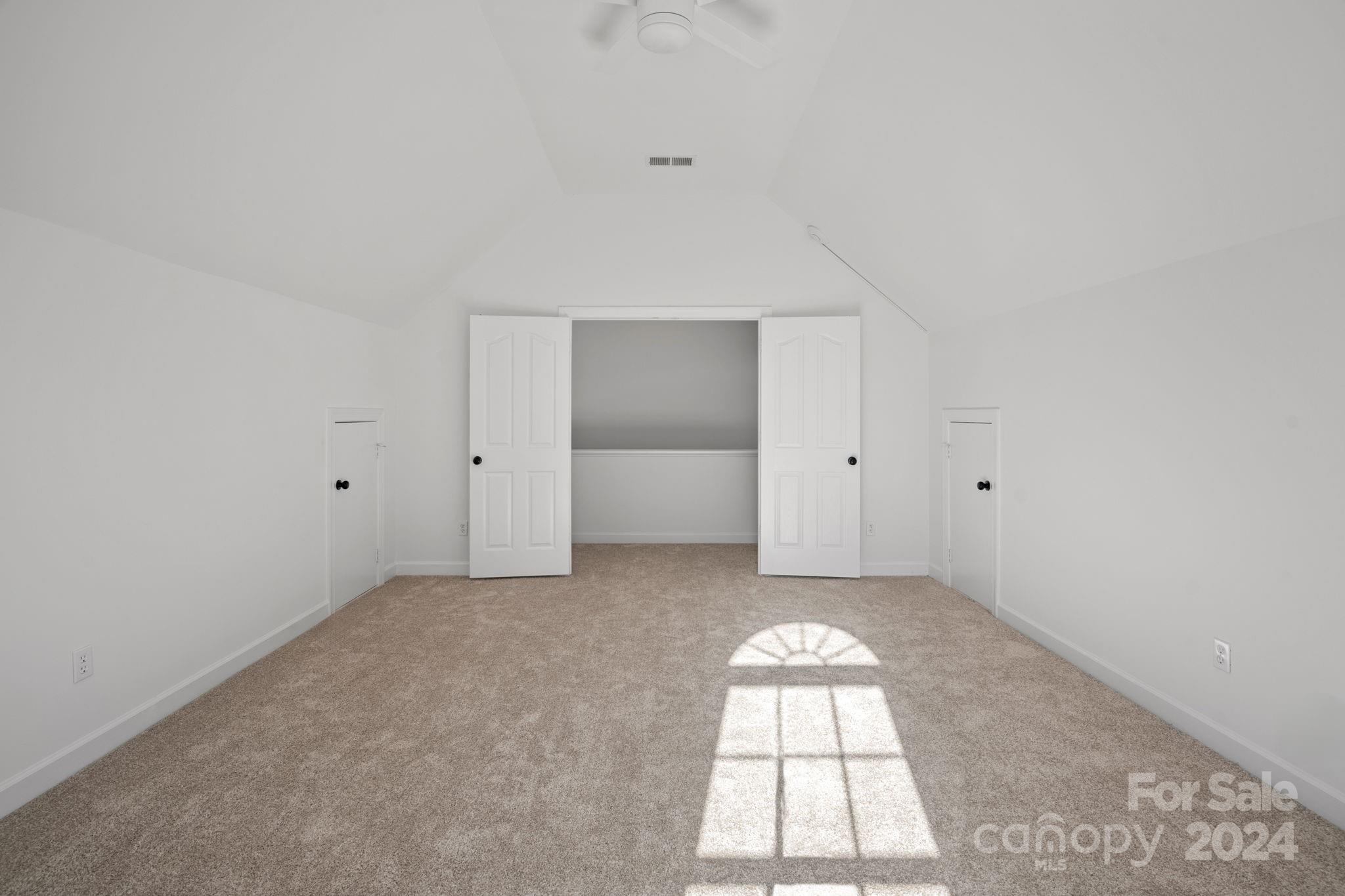 3425 Rhett Butler Place Charlotte, NC 28270 - Photo 33 of 48 an empty room with a window and cabinet