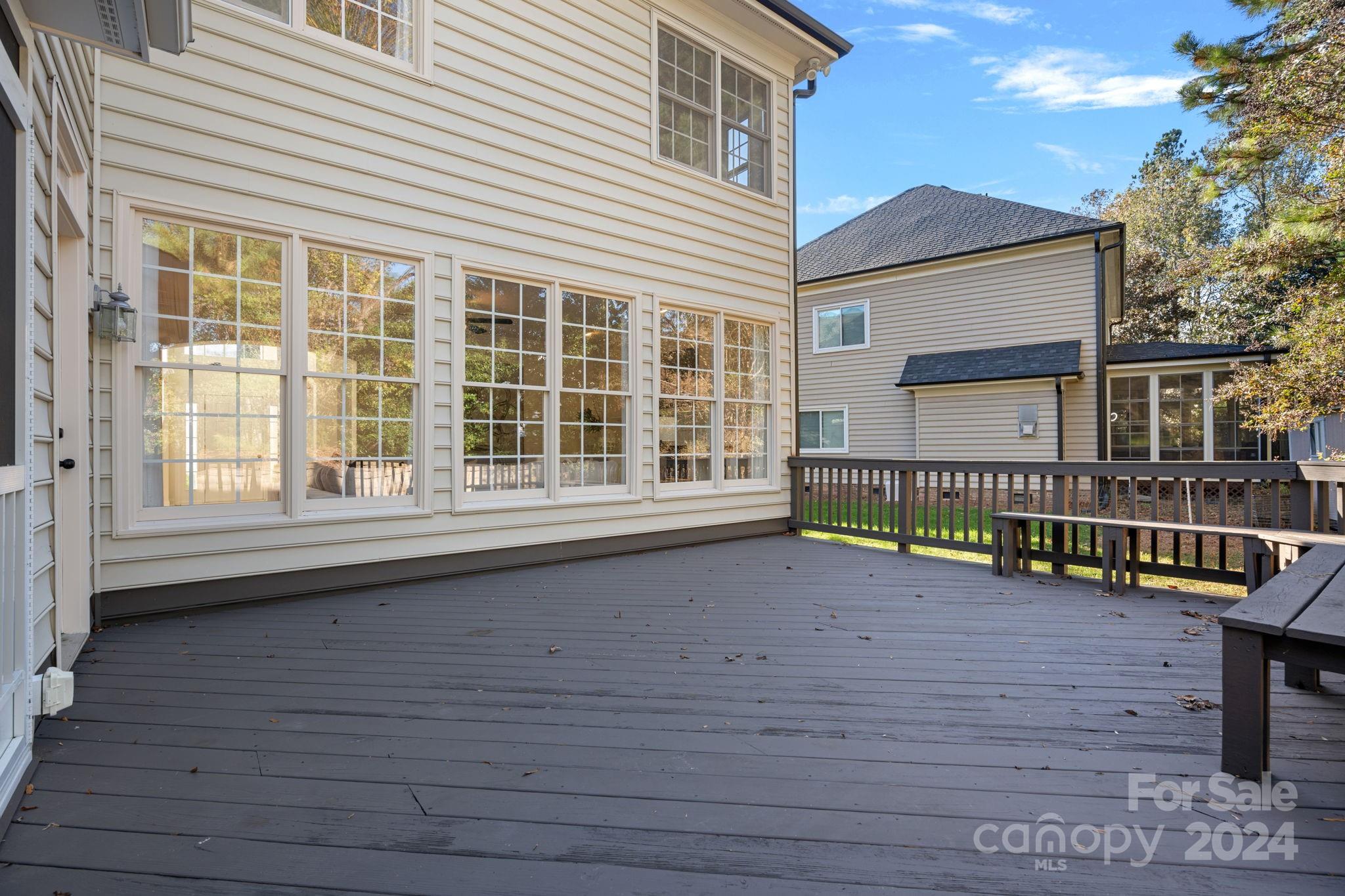 3425 Rhett Butler Place Charlotte, NC 28270 - Photo 37 of 48 a view of a house with wooden deck