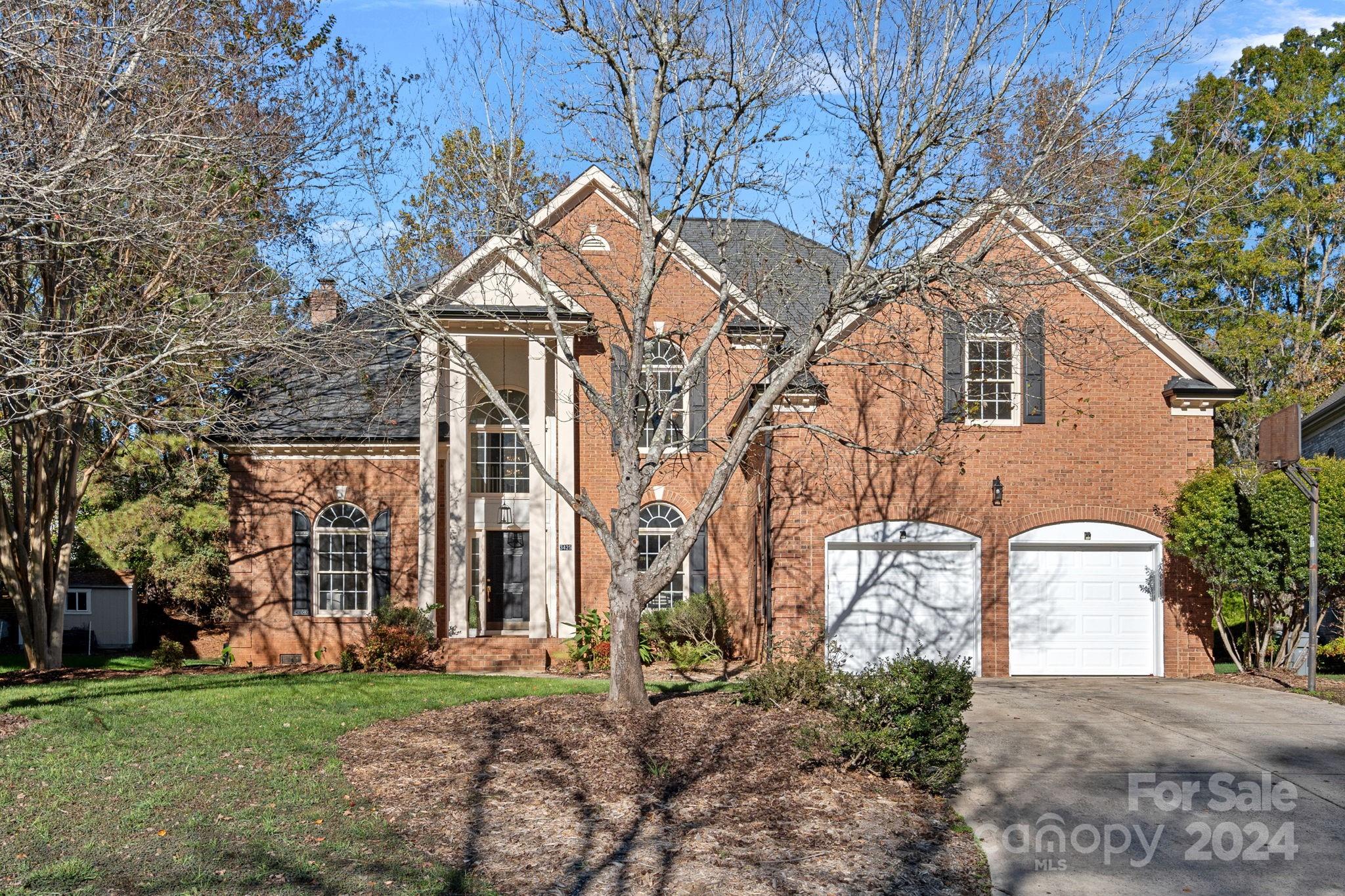 3425 Rhett Butler Place Charlotte, NC 28270 - Photo 42 of 48 a view of a house with a yard