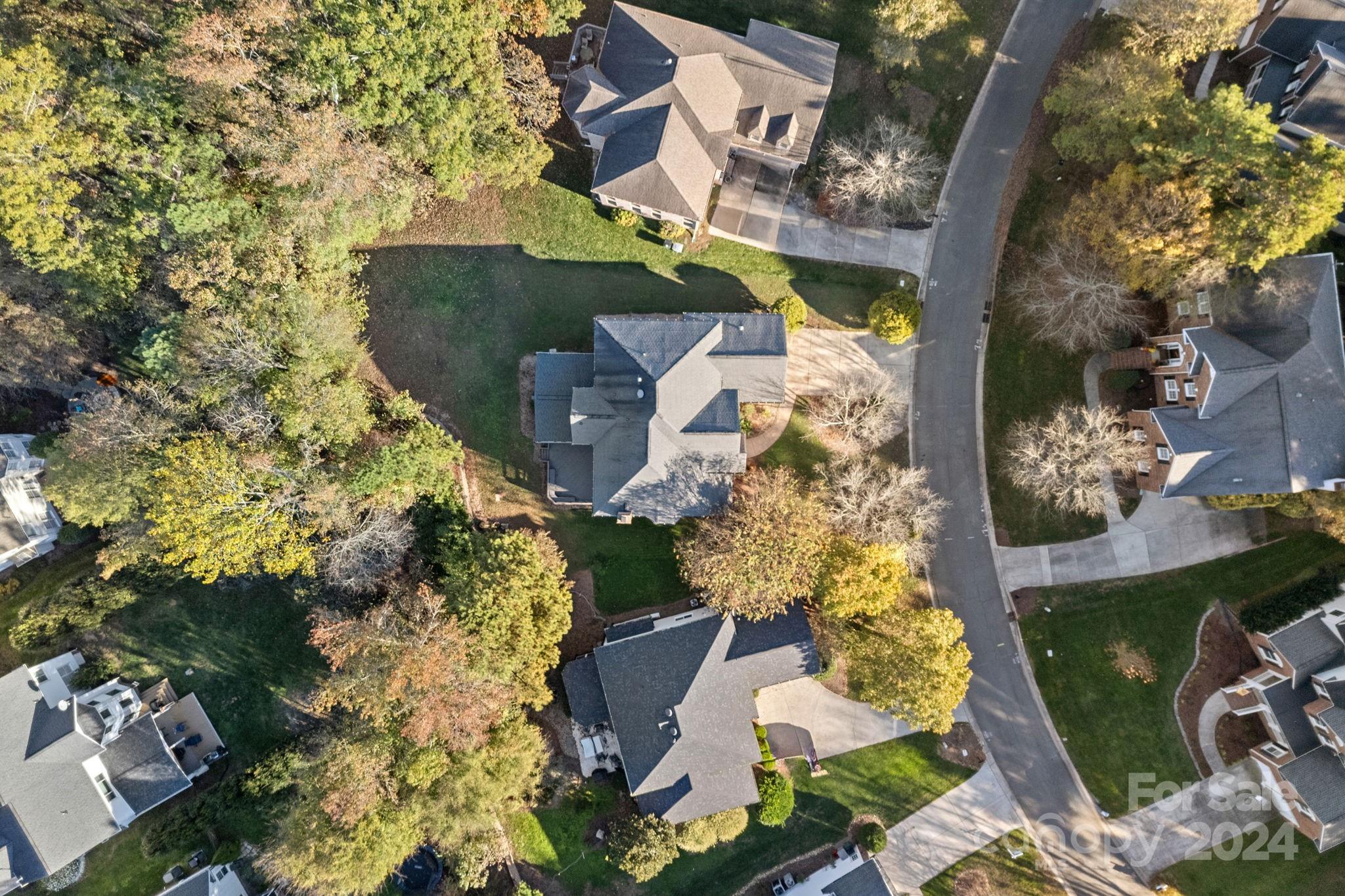 3425 Rhett Butler Place Charlotte, NC 28270 - Photo 46 of 48 an aerial view of a house with a yard and garden