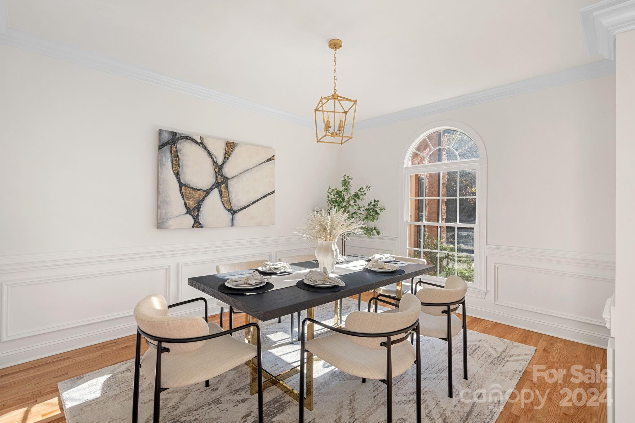 3425 Rhett Butler Place Charlotte, NC 28270 - Photo 6 of 48 a view of a dining room with furniture and wooden floor