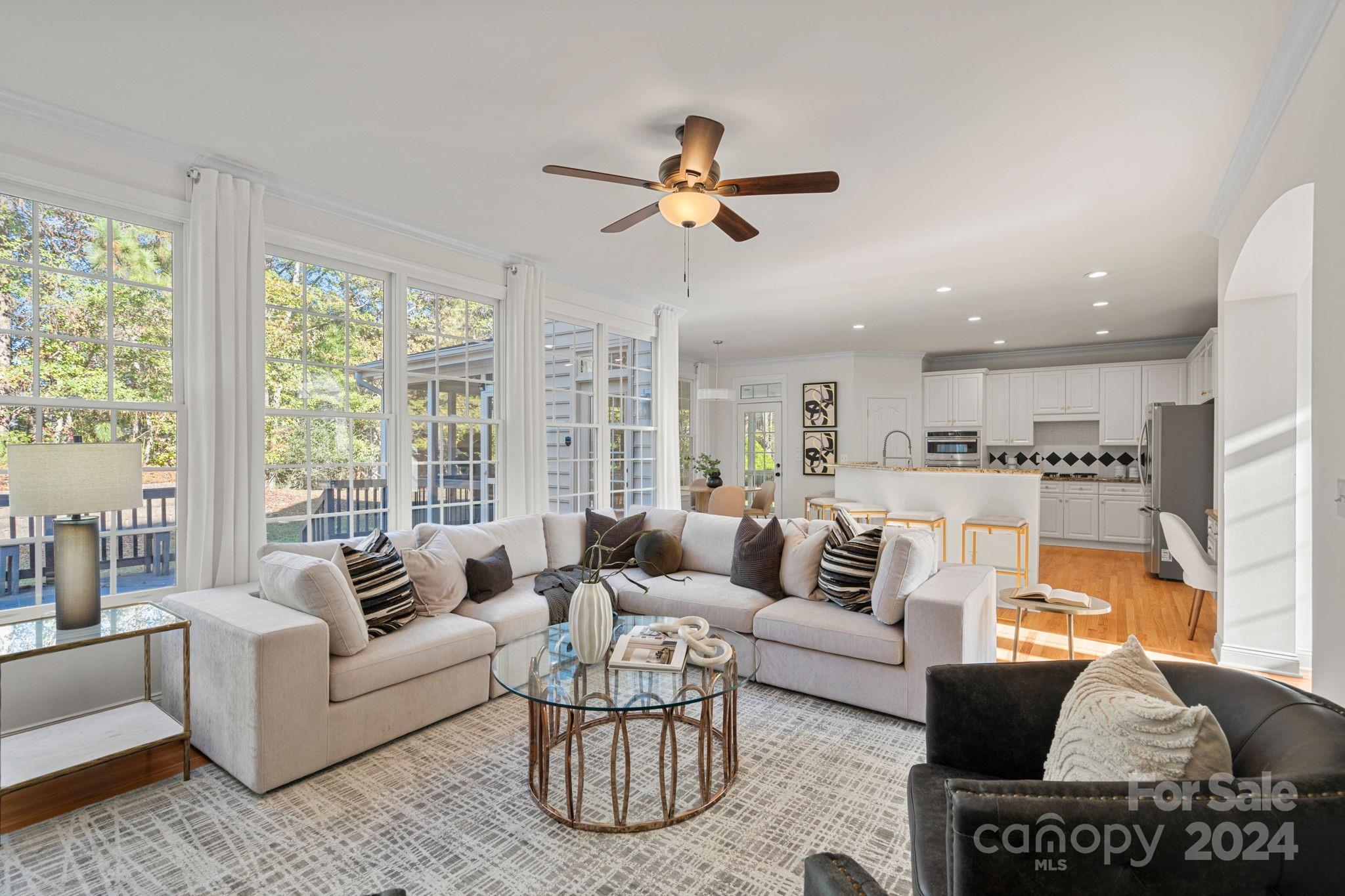 3425 Rhett Butler Place Charlotte, NC 28270 - Photo 10 of 48 a living room with furniture and a large window