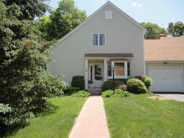 166 Pheasant Ridge, Unit 166 Shelton, CT 06484 - Photo 1 of 1 a front view of a house with garden