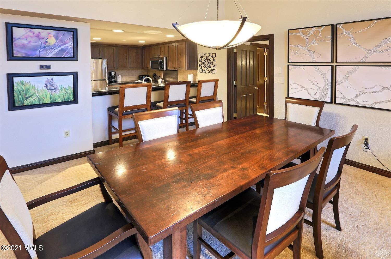 210 Offerson Road, Unit 31748 Beaver Creek, CO 81620 - Photo 4 of 16 a room with furniture pool table and flat screen tv