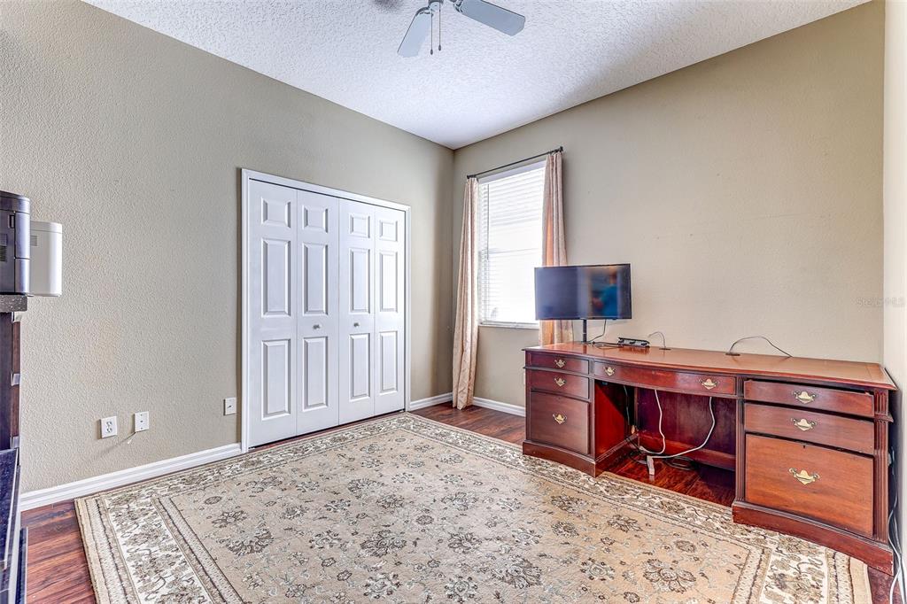 918 Algare Loop Windermere, FL 34786 - Photo 8 of 73 a view of a workspace with furniture and a window