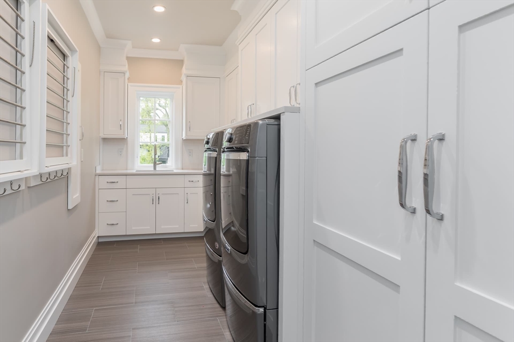8 Hidden Road Weston, MA 02493 - Photo 24 of 42 a kitchen with a refrigerator and a sink