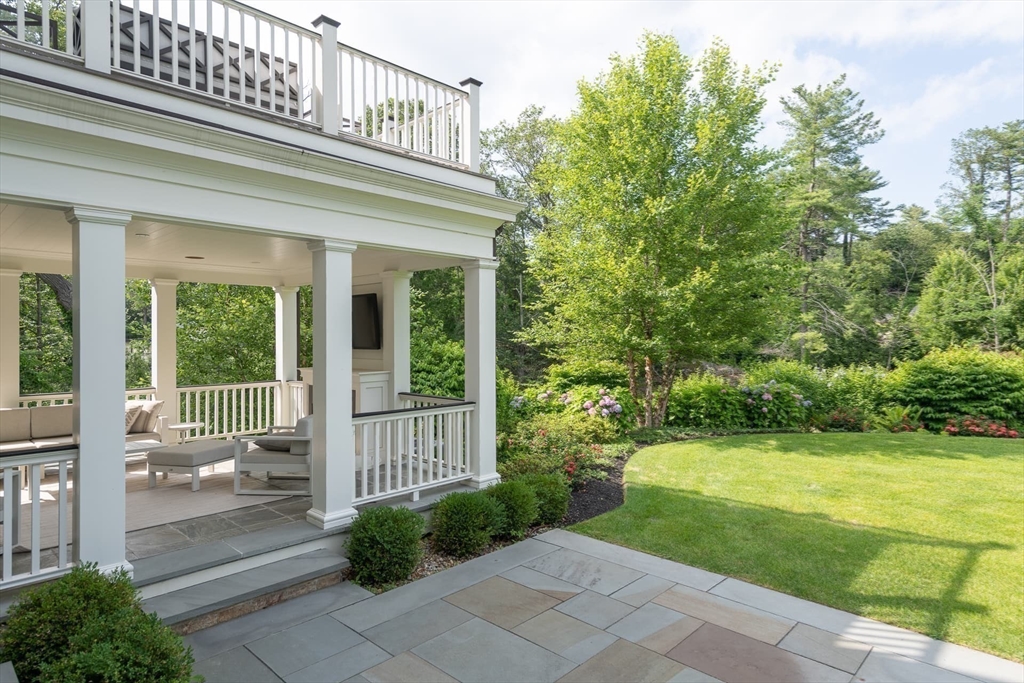8 Hidden Road Weston, MA 02493 - Photo 41 of 42 a view of a house with a garden