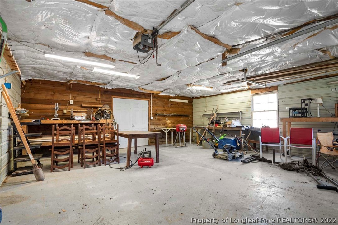 5011 Maxwell Road Autryville, NC 28318 - Photo 32 of 36 a view of a room with gym equipment