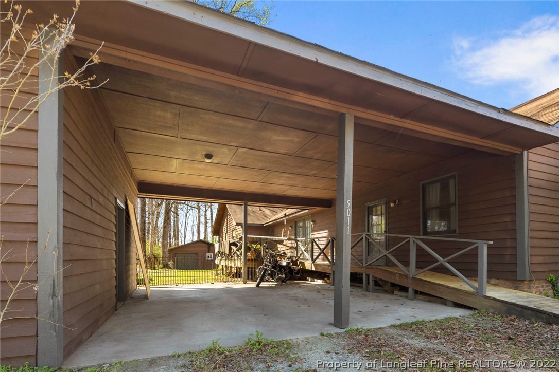 5011 Maxwell Road Autryville, NC 28318 - Photo 33 of 36 a view of an empty room with wooden floor