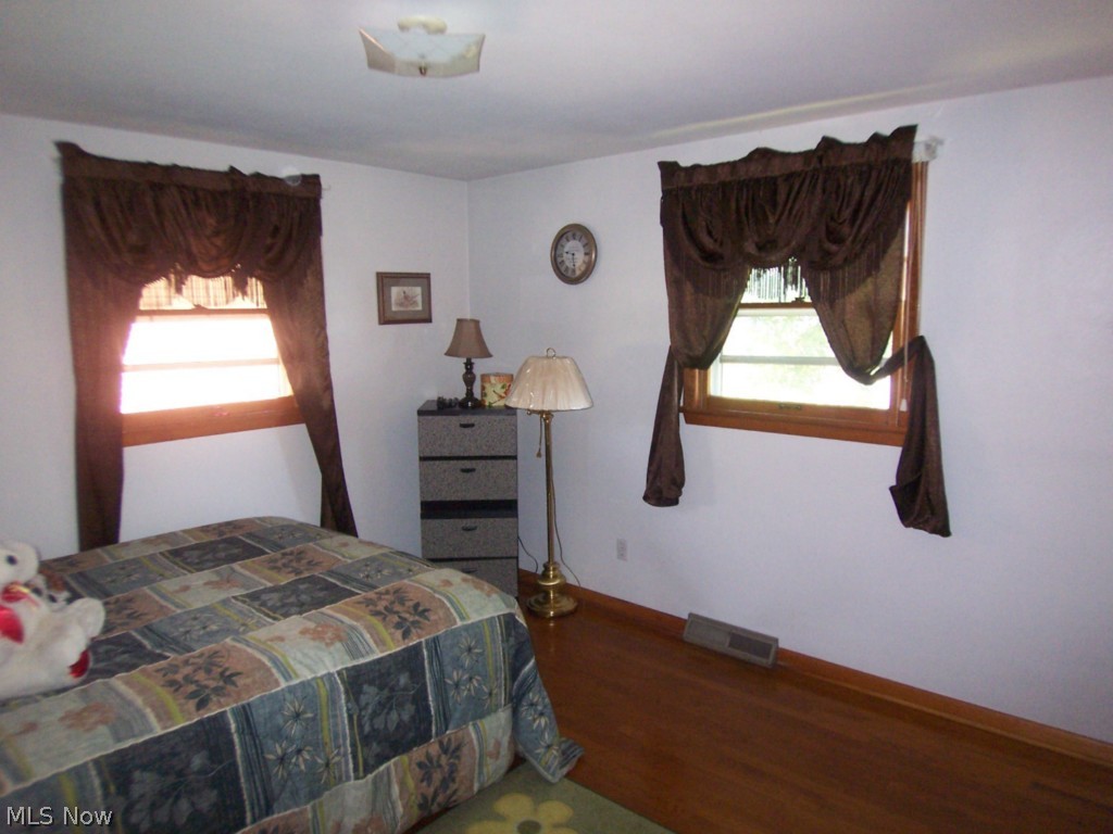 1608 Meister Road Lorain, OH 44053 - Photo 11 of 25 The second bedroom on the main floor. Note the beautiful oak floors!