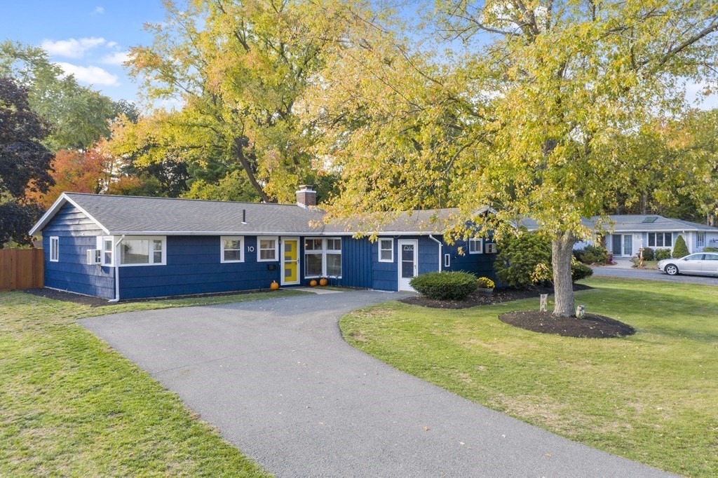 10 Clara Road Framingham, MA 01701 - Photo 3 of 42 a front view of a house with garden
