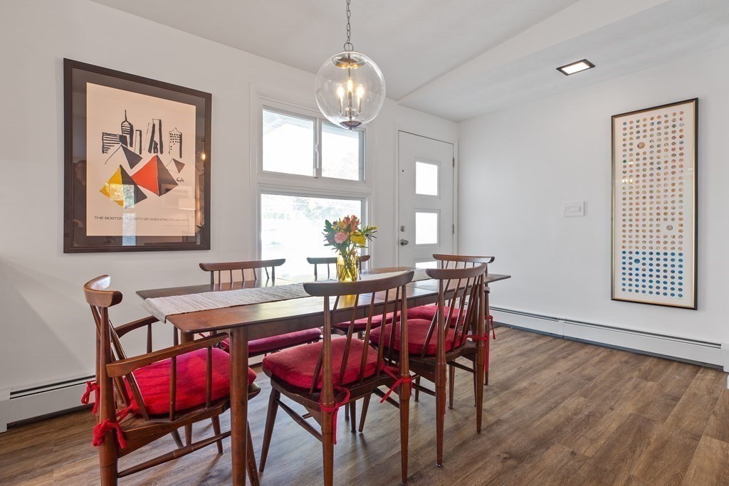 10 Clara Road Framingham, MA 01701 - Photo 8 of 42 a view of a dining room with furniture window and wooden floor