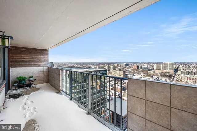 a view of balcony with furniture