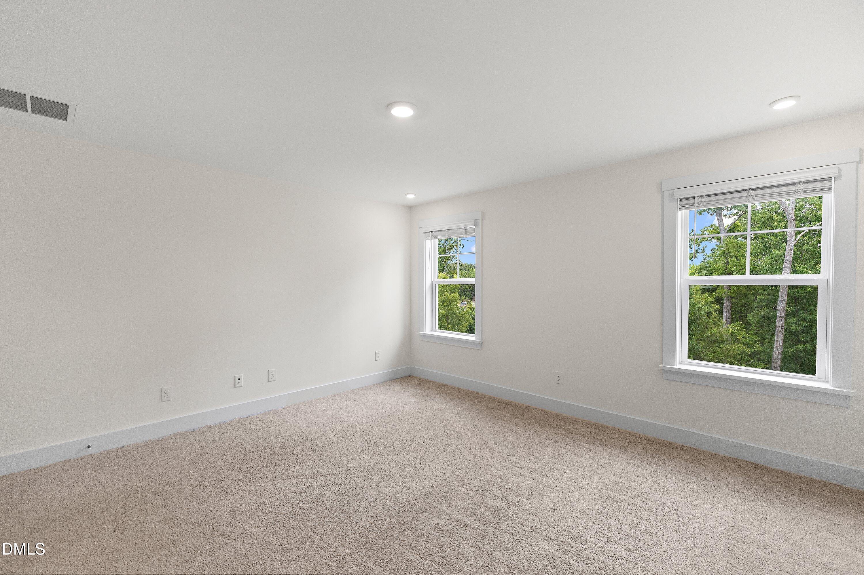 156 Sears Ridge Lane Morrisville, NC 27560 - Photo 21 of 49 an empty room with a window