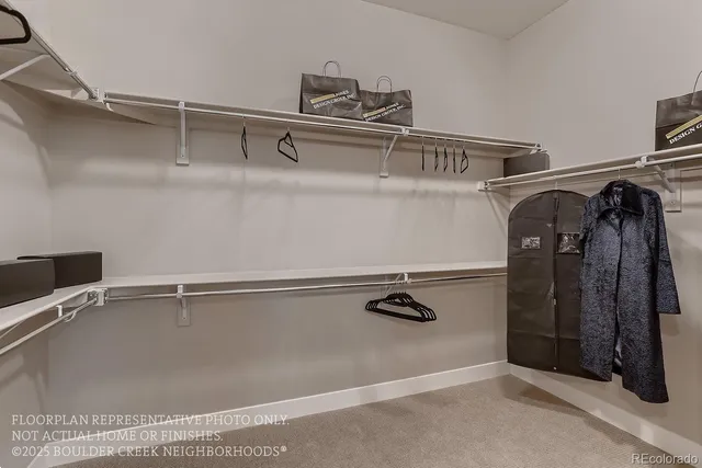 a bedroom with a bed and a bathroom