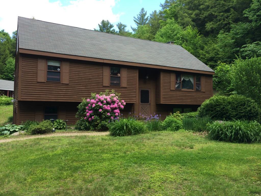 10 Old Coach Road Barkhamsted, CT 06063 - Photo 1 of 1 a backyard of a house with lots of green space