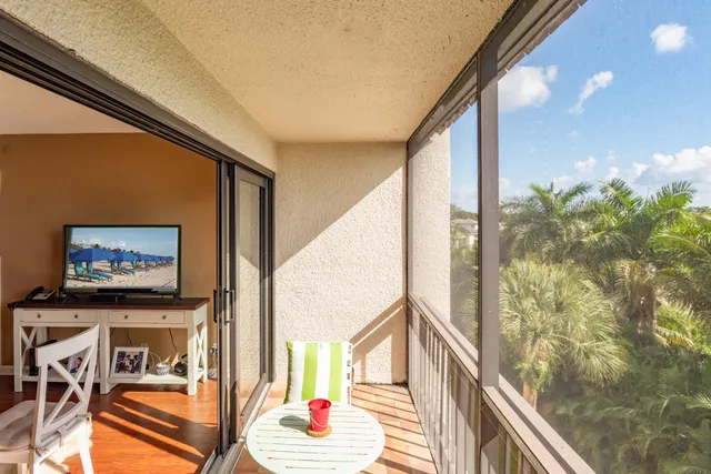 a view of a entryway door with furniture