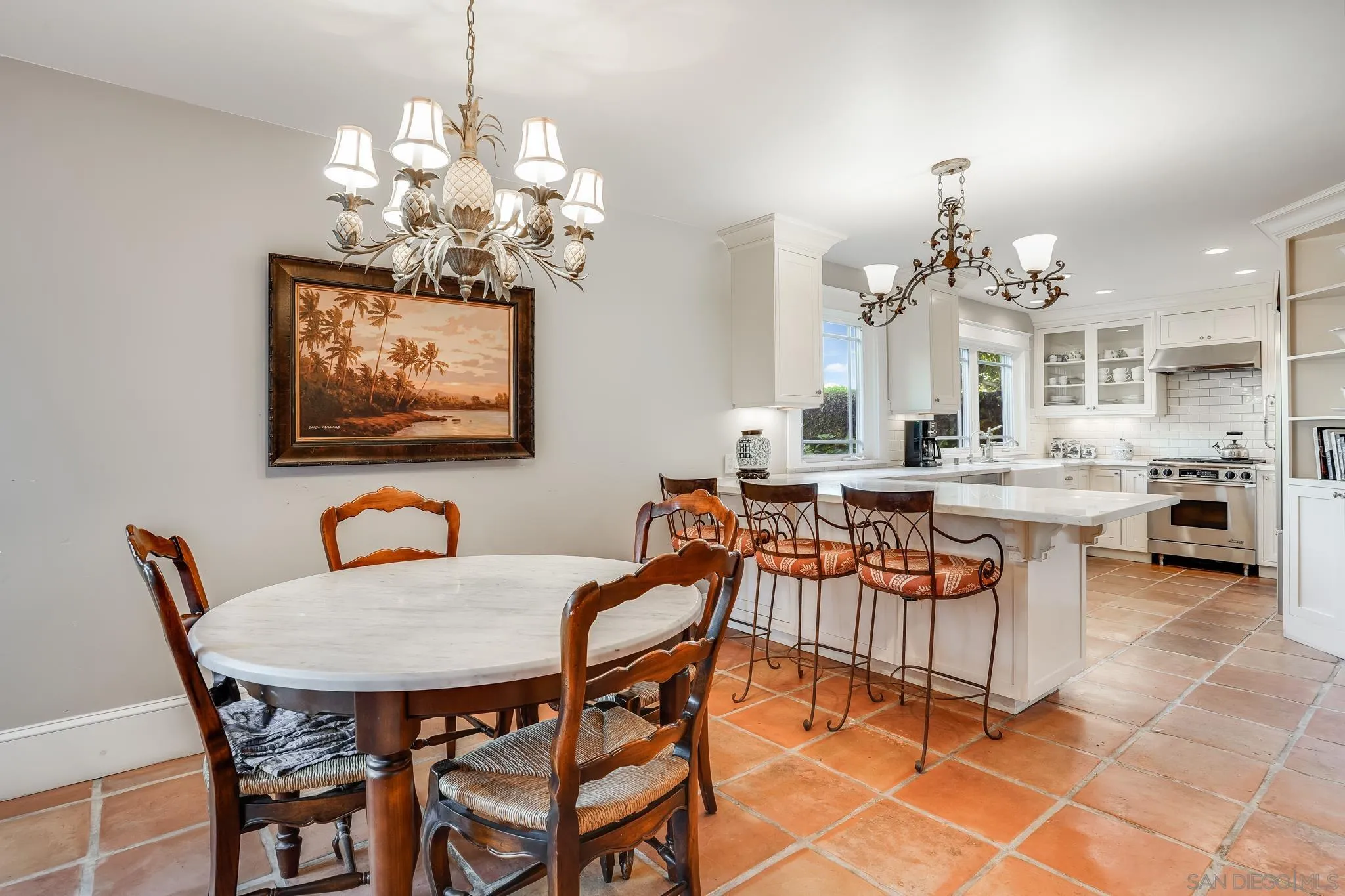 2 The Inlet Coronado, CA 92118 - Photo 11 of 40 a dining room filled with furniture and chandelier