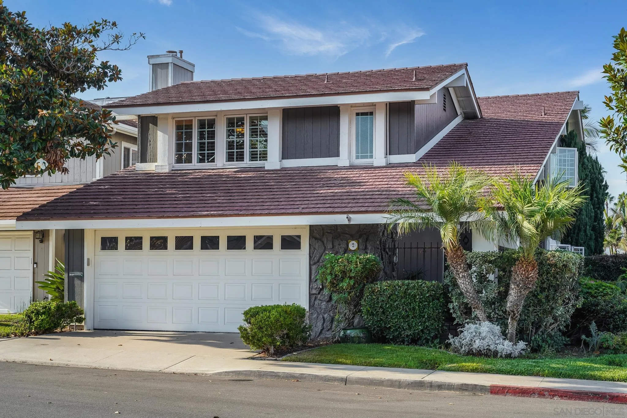 2 The Inlet Coronado, CA 92118 - Photo 2 of 40 a house that has a tree in front of it