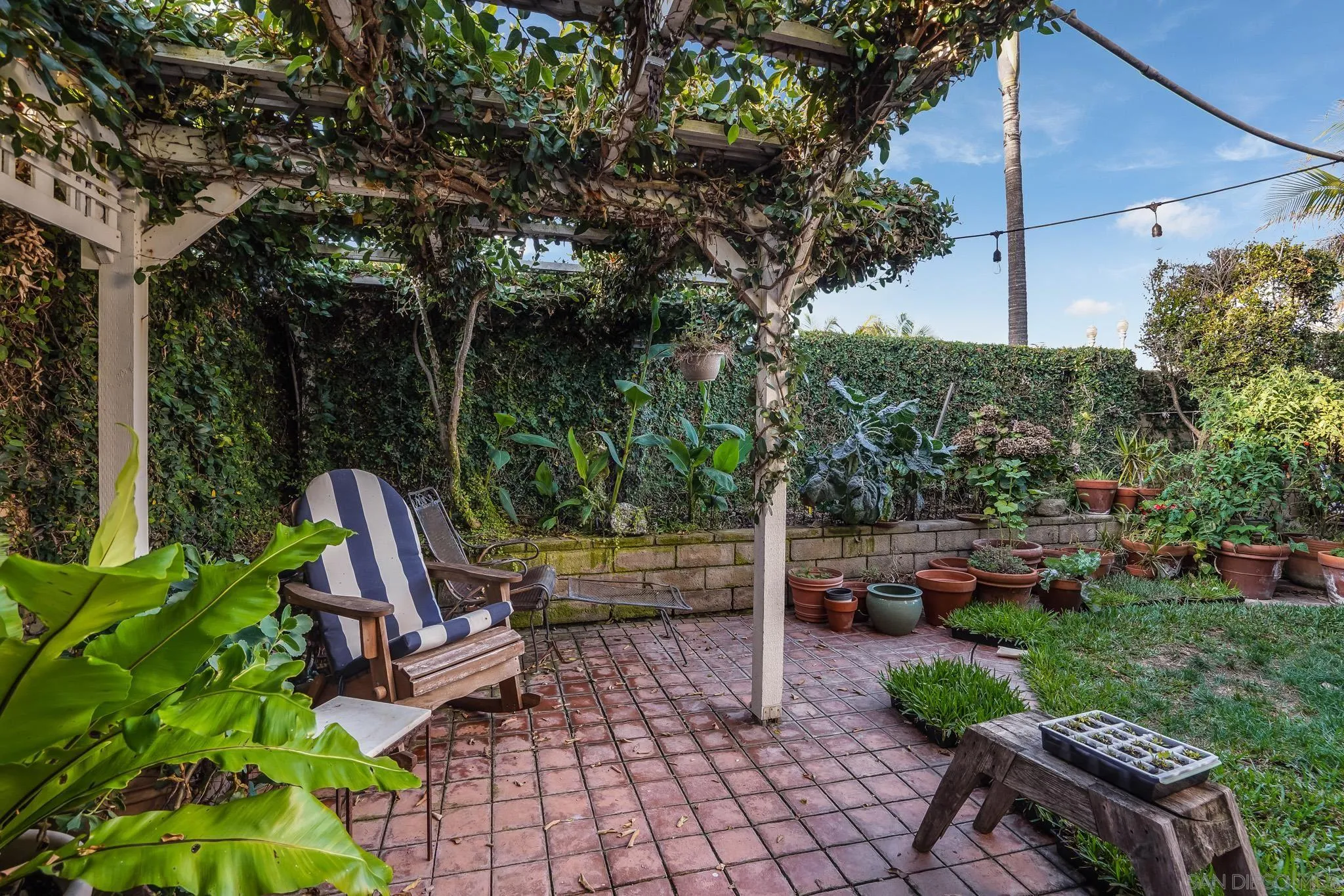 2 The Inlet Coronado, CA 92118 - Photo 38 of 40 a view of a chair and tables in the garden