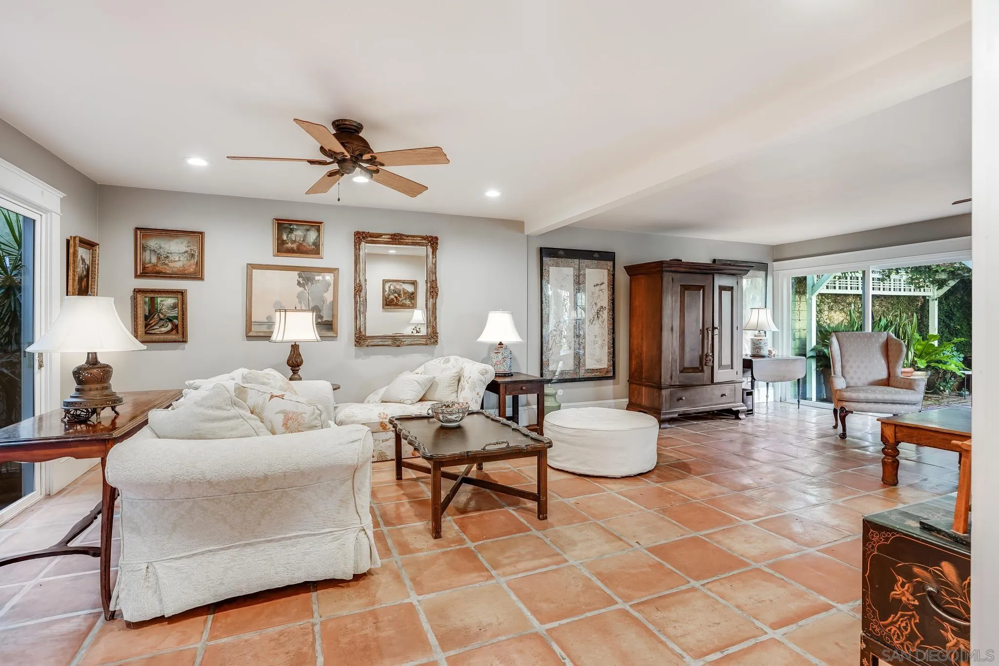 2 The Inlet Coronado, CA 92118 - Photo 6 of 40 a living room with fireplace furniture and a large window