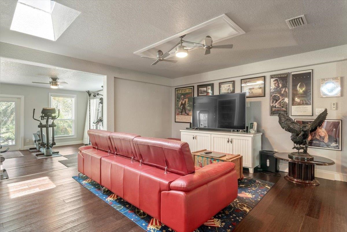 6342 Salado Road St. Augustine, FL 32080 - Photo 15 of 74 a living room with furniture and a flat screen tv