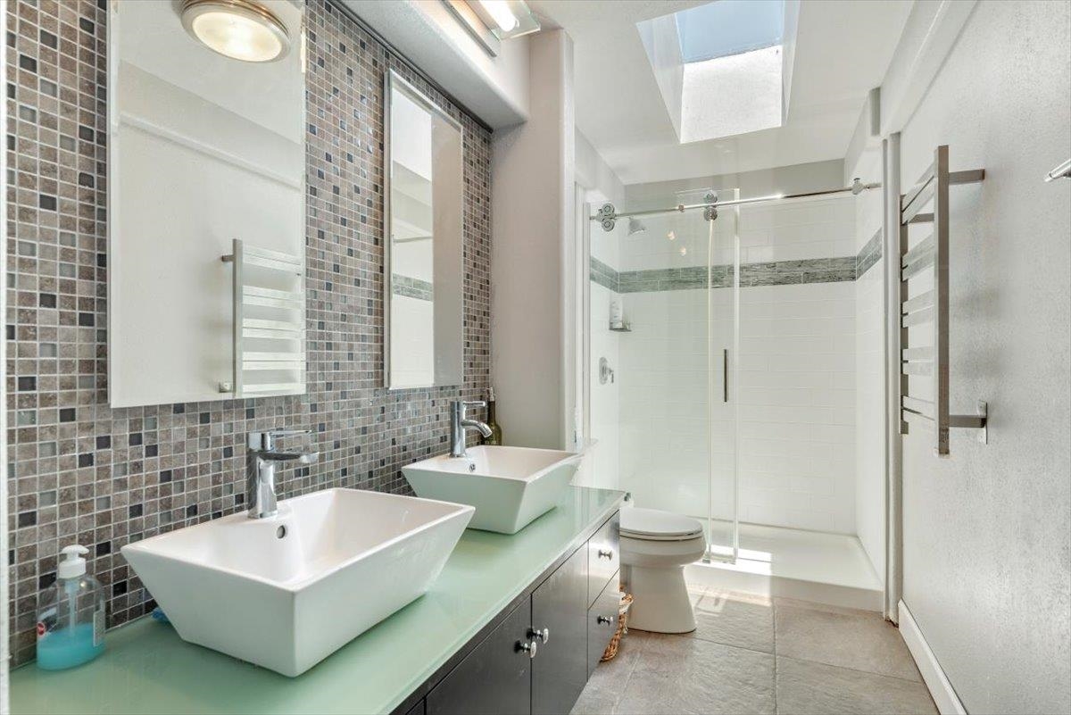 6342 Salado Road St. Augustine, FL 32080 - Photo 31 of 74 a bathroom with a bathtub shower sink and toilet
