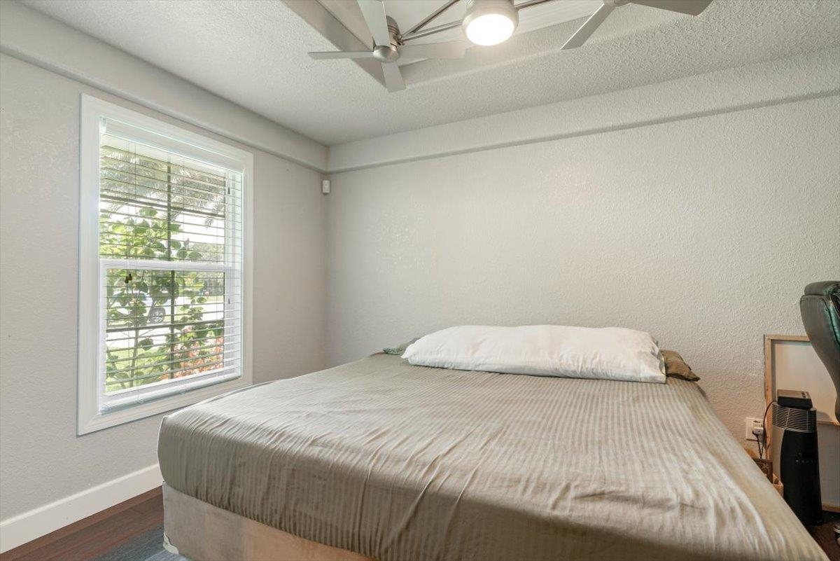 6342 Salado Road St. Augustine, FL 32080 - Photo 39 of 74 a bedroom with a bed and a window