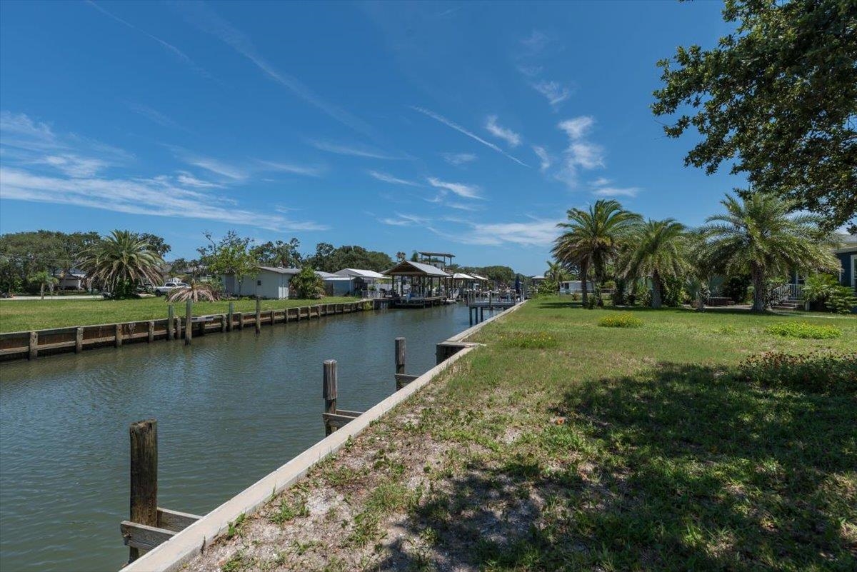 6342 Salado Road St. Augustine, FL 32080 - Photo 4 of 74 a view of a lake with a yard