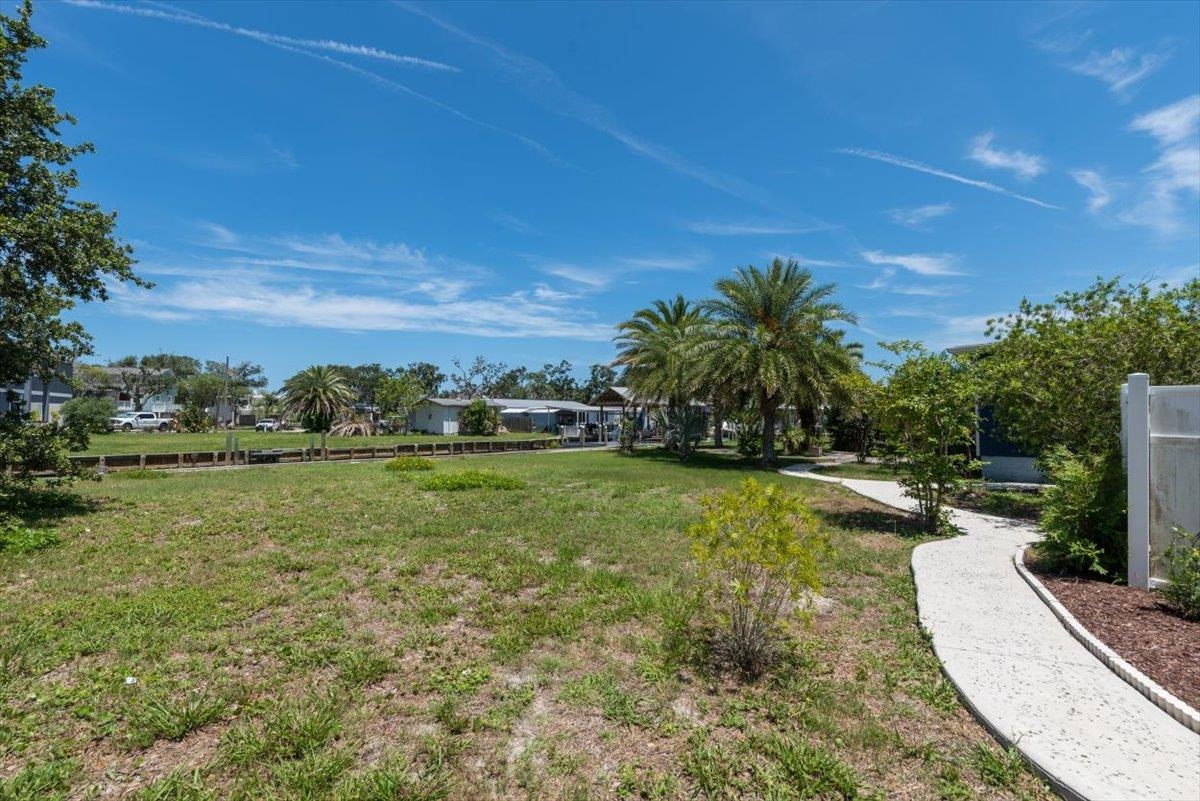 6342 Salado Road St. Augustine, FL 32080 - Photo 53 of 74 a view of a water fountain and a big yard