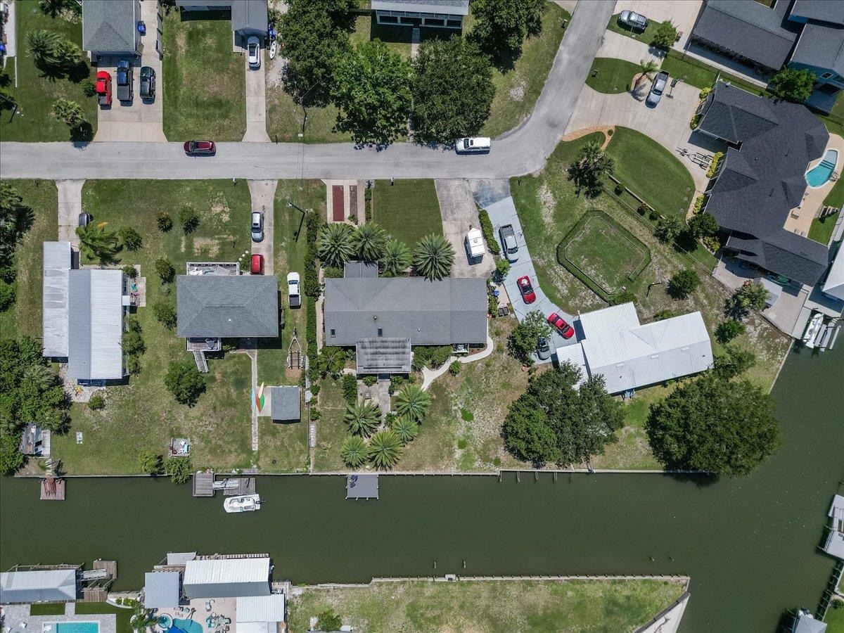 6342 Salado Road St. Augustine, FL 32080 - Photo 69 of 74 an aerial view of a house with a lake view