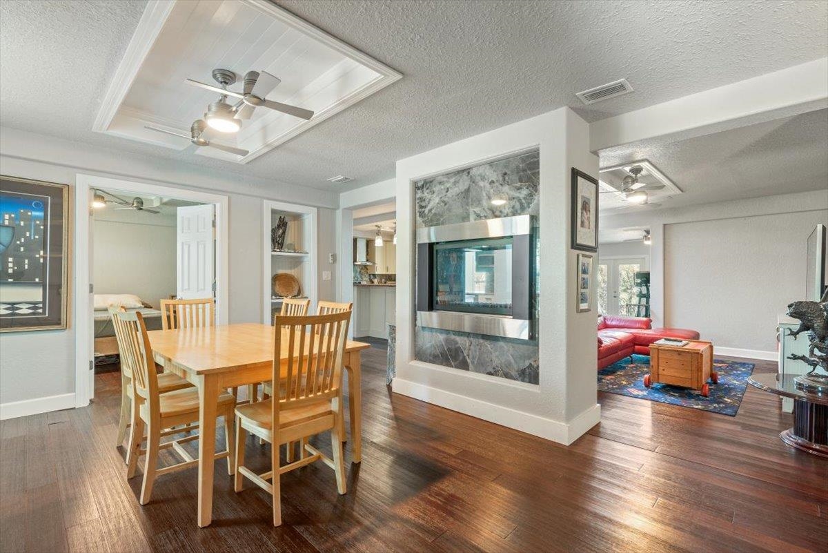 6342 Salado Road St. Augustine, FL 32080 - Photo 7 of 74 a view of a dining room with furniture wooden floor and chandelier