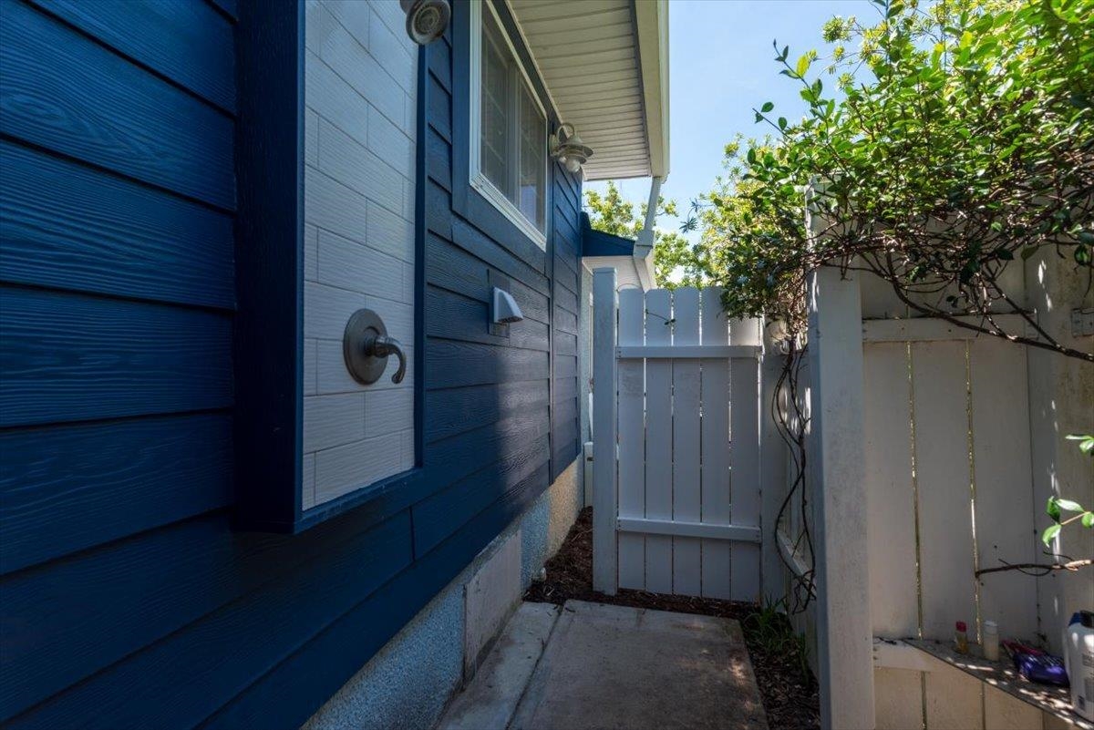 6342 Salado Road St. Augustine, FL 32080 - Photo 8 of 74 a view of a house with a door and wooden wall