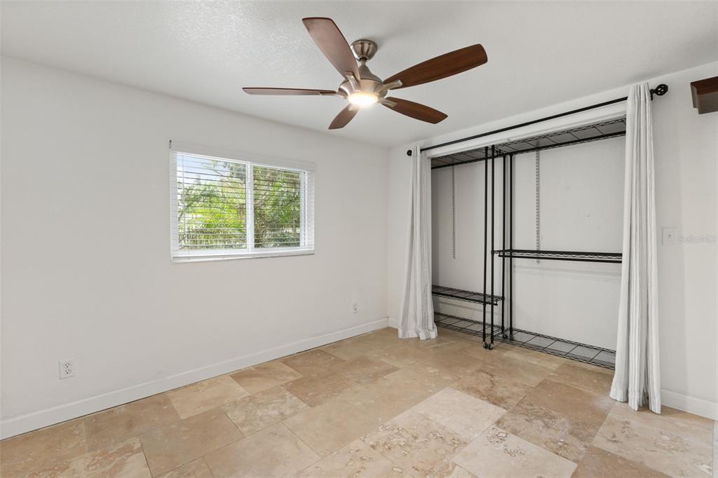 2462 Fort Lane Road Geneva, FL 32732 - Photo 16 of 31 a view of empty room with wooden floor and ceiling fan