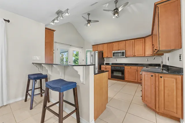 a view of a swimming pool with a patio