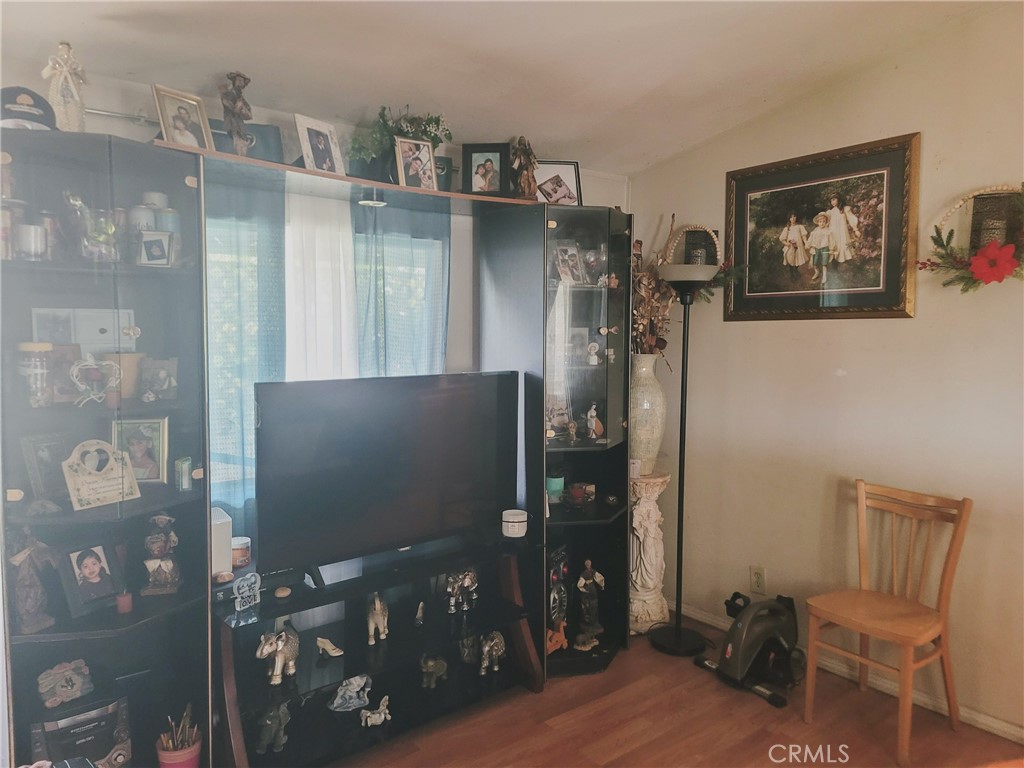 2500 North State Highway 59, Unit 278 Merced, CA 95348 - Photo 12 of 30 a view of a livingroom with furniture and a flat screen tv
