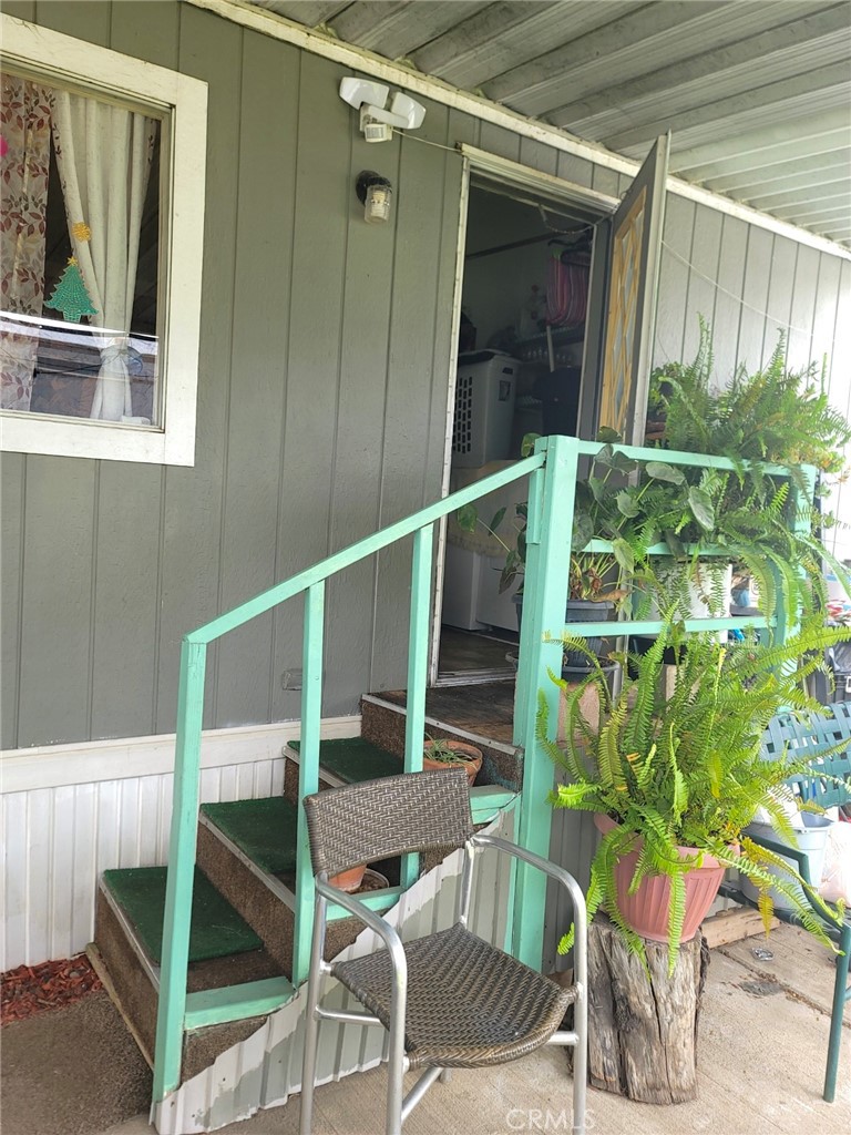 2500 North State Highway 59, Unit 278 Merced, CA 95348 - Photo 7 of 30 a balcony with table and chairs