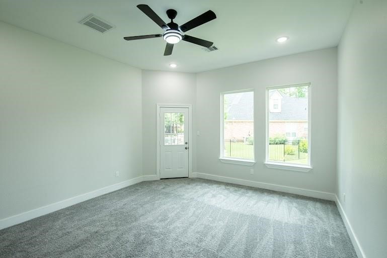 216 Monterrey Road West Montgomery, TX 77356 - Photo 13 of 26 an empty room with a window and a fan