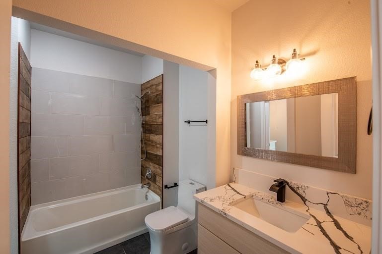 216 Monterrey Road West Montgomery, TX 77356 - Photo 23 of 26 a bathroom with a sink a toilet and shower