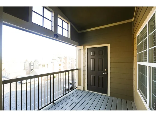 a view of a balcony with an outdoor space