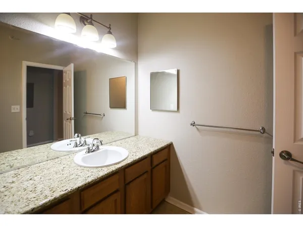 a bathroom with a toilet and a bathtub