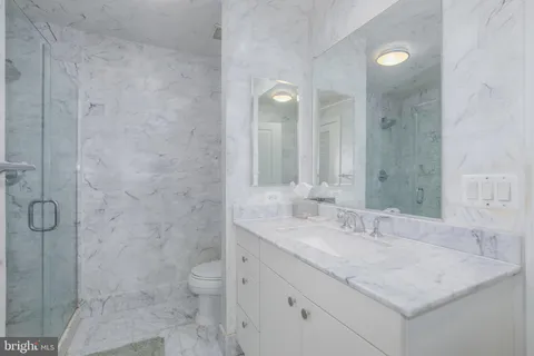 a bathroom with a bathtub and a sink